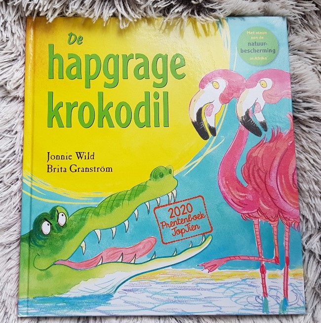 De hapgrage krokodil voorkant cover omslag kaft flamingo